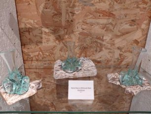 Molten glass on whitewash wood